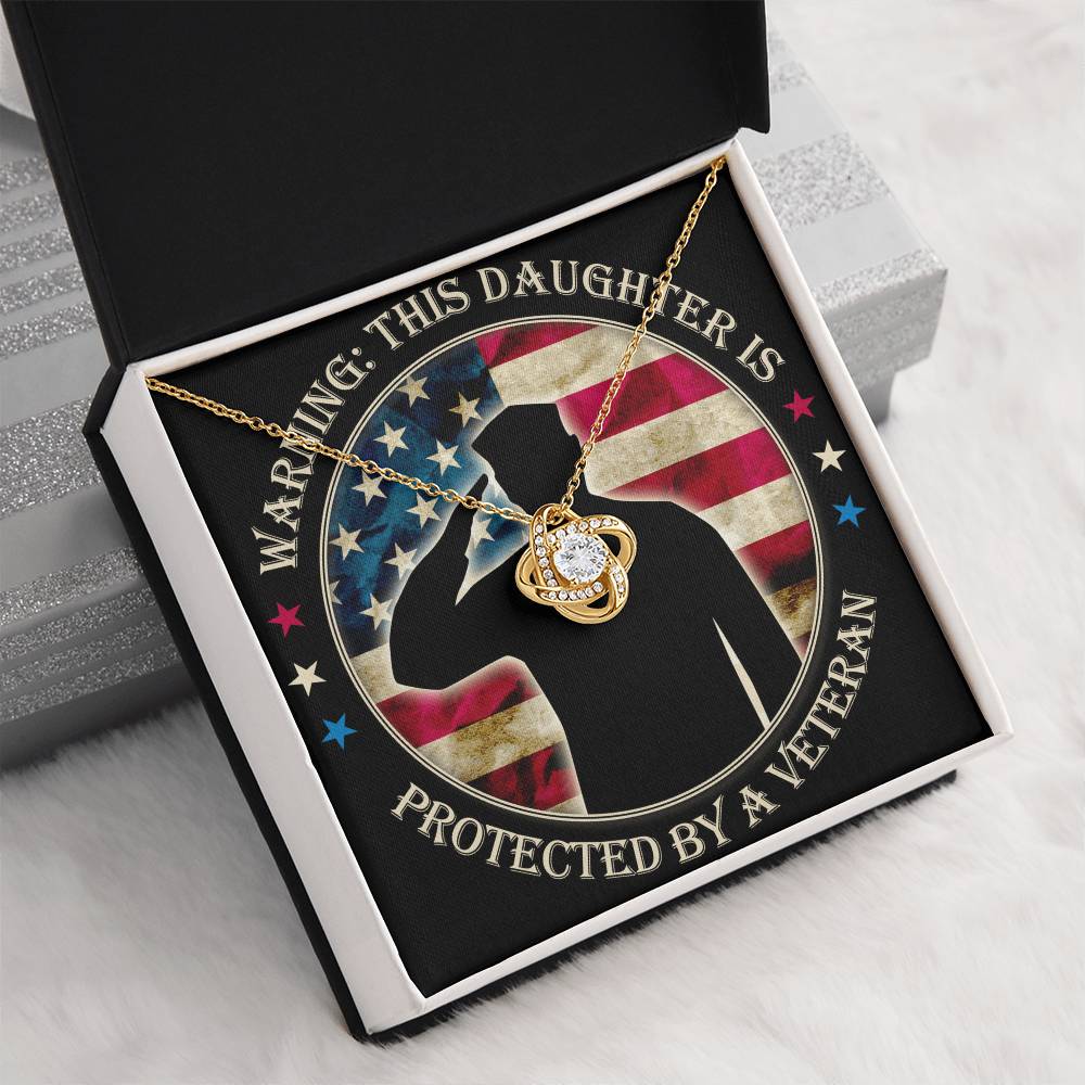 Warning: This Daughter Is Protected by a Veteran Mom ~ Love Knot Neckla ~ necklace shown with its message card in a gift box