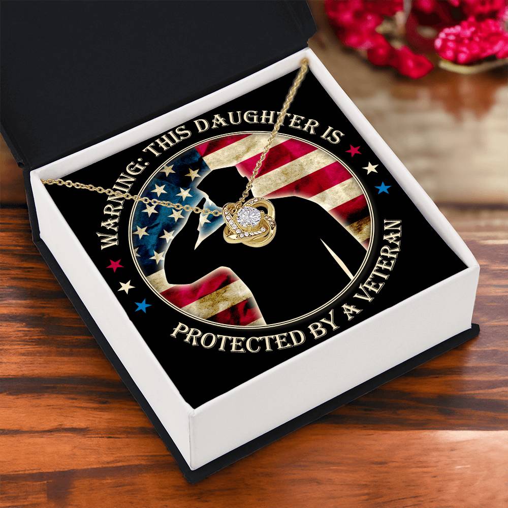 Warning: This Daughter Is Protected by a Veteran Mom ~ Love Knot Neckla ~ necklace shown with its message card in a gift box