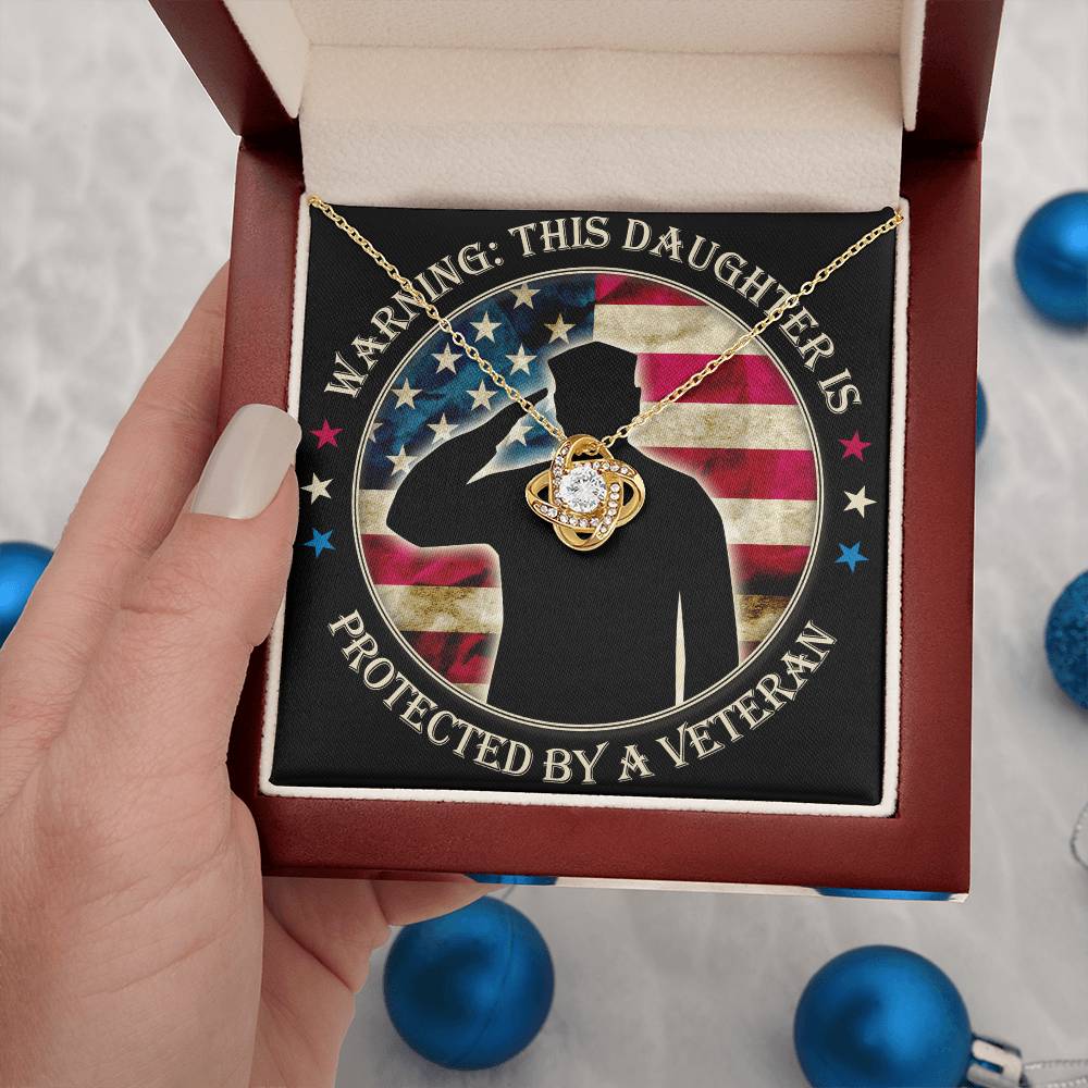 Warning: This Daughter Is Protected by a Veteran Mom ~ Love Knot Neckla ~ necklace shown with its message card in a gift box