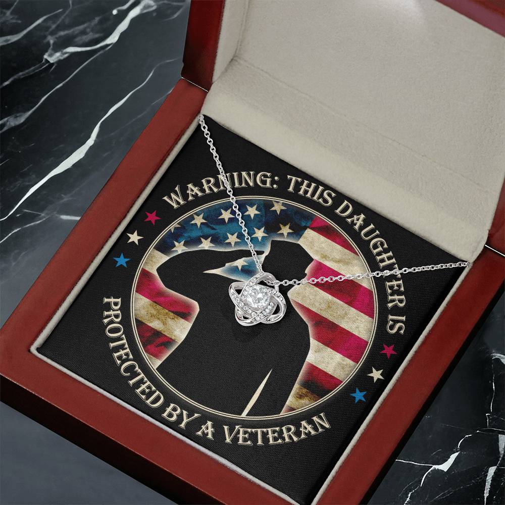 Warning: This Daughter Is Protected by a Veteran Mom ~ Love Knot Neckla ~ necklace shown with its message card in a gift box