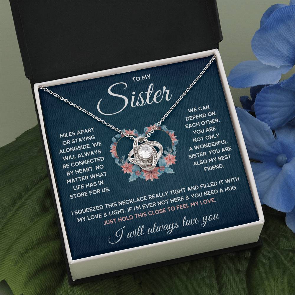 To My Sister Squeezed Love Knot Necklace Gift Set ~ necklace shown with its message card in a gift box